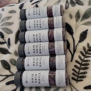 6 unopened bottles of "itworks" hair skin and nail vitamins